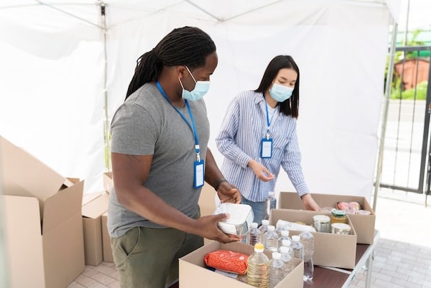A diverse group of volunteers working together to pack and distribute emergency relief supplies.