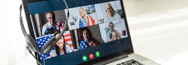 A split screen showing a USAID official coordinating with a UN counterpart via video call. The USAID official is in a field office with emergency supplies in the background, while the UN official is in a situation room with maps and data screens visible. The image captures real-time coordination in action.