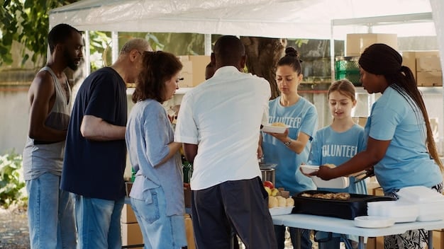A group of US volunteers organizing a fundraising event for a UN relief program, featuring a banner with the UN logo and images of people benefiting from the program. The volunteers are actively engaging with attendees, collecting donations, and providing information about the cause.