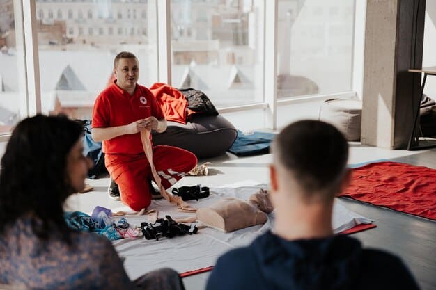 A group of emergency responders participating in a disaster simulation exercise. Show them coordinating, using communication equipment, and providing first aid.