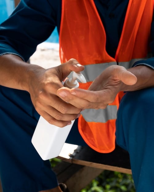 A close-up shot of hands exchanging supplies (e.g., water bottles, blankets) between international aid workers and US disaster survivors, emphasizing the direct impact of the aid.