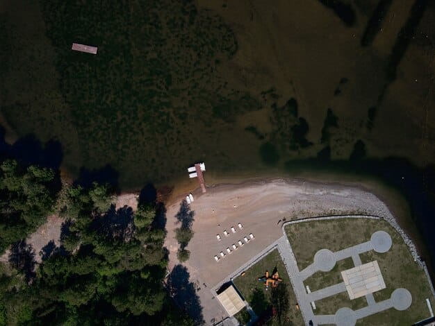 A drone flying over a flooded area, capturing high-resolution imagery to assess the extent of the damage and identify areas in need of immediate assistance.
