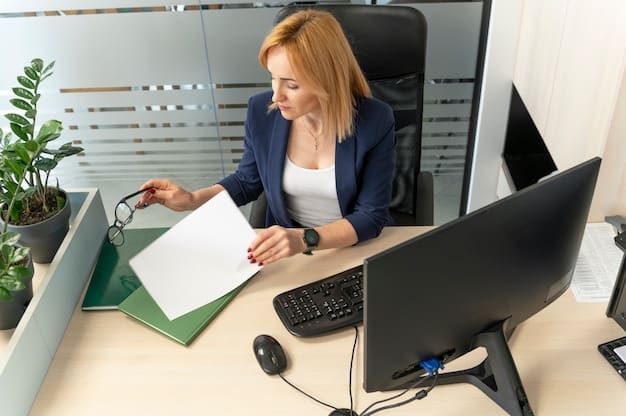 A person sitting at a desk, filling out paperwork with the assistance of a caseworker. The scene depicts a community center with resources available for displaced individuals, highlighting the process of accessing support services and understanding legal paperwork.
