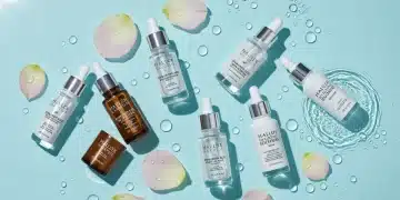 Sérums Faciales con Ácido Hialurónico 2025: Guía para Piel Seca Selección premium de sérums de ácido hialurónico para piel seca en 2025, con envases elegantes y una sensación de frescura e hidratación.